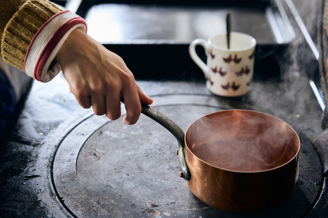 Heating bone broth on stove